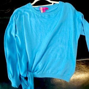 Side tie sweater worn a couple of times.